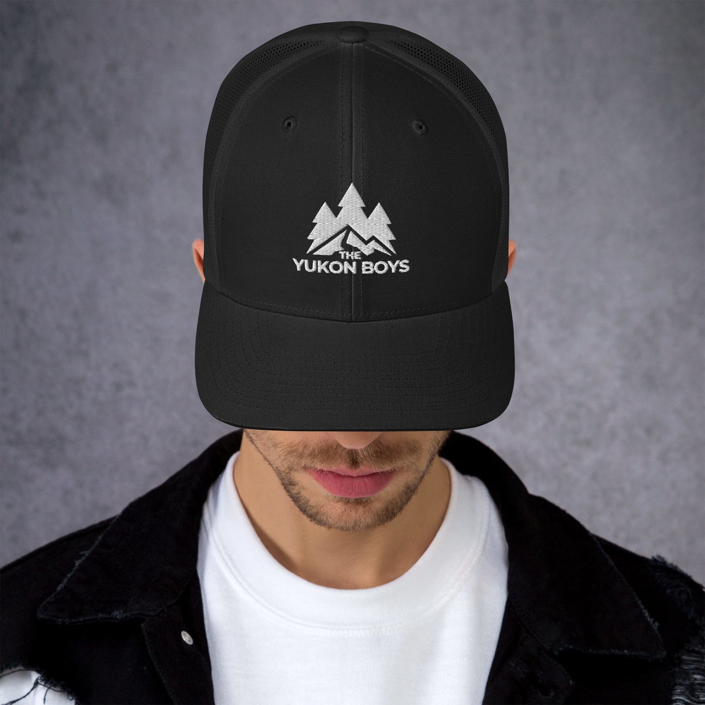 The Yukon Boys Trucker Cap in Black, front view
