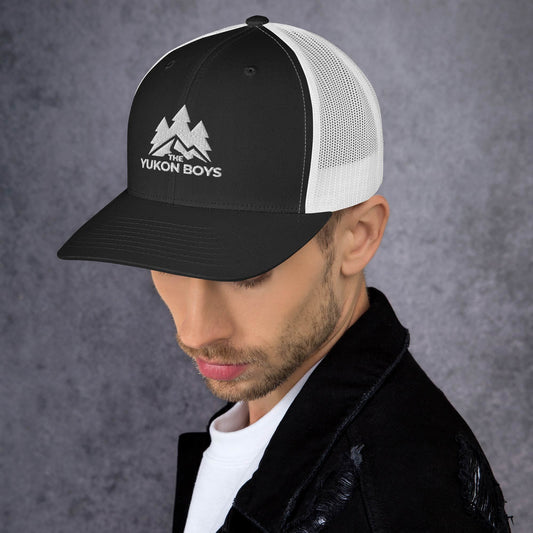 The Yukon Boys Trucker Cap in Black White, left side view