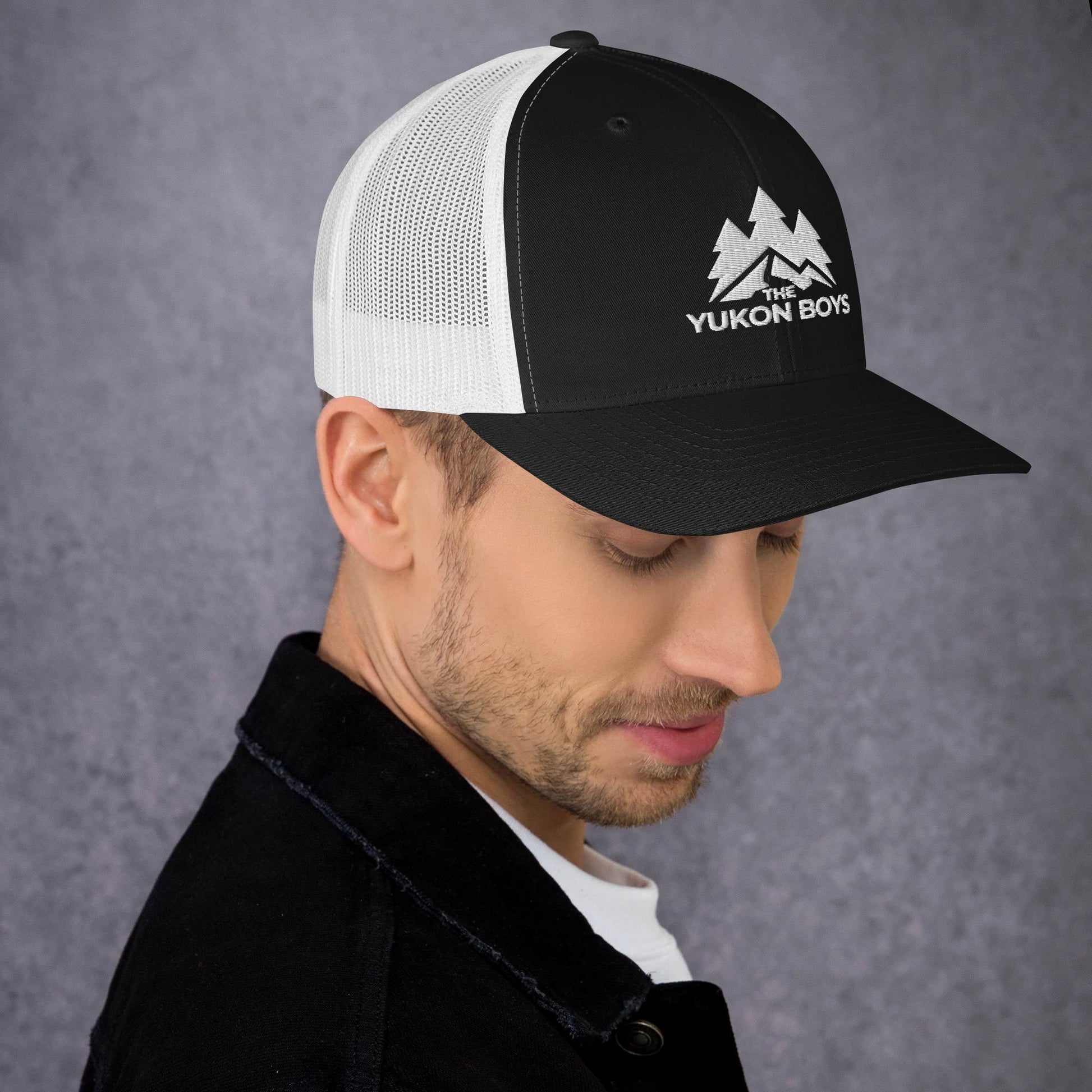 The Yukon Boys Trucker Cap in Black White, right side view