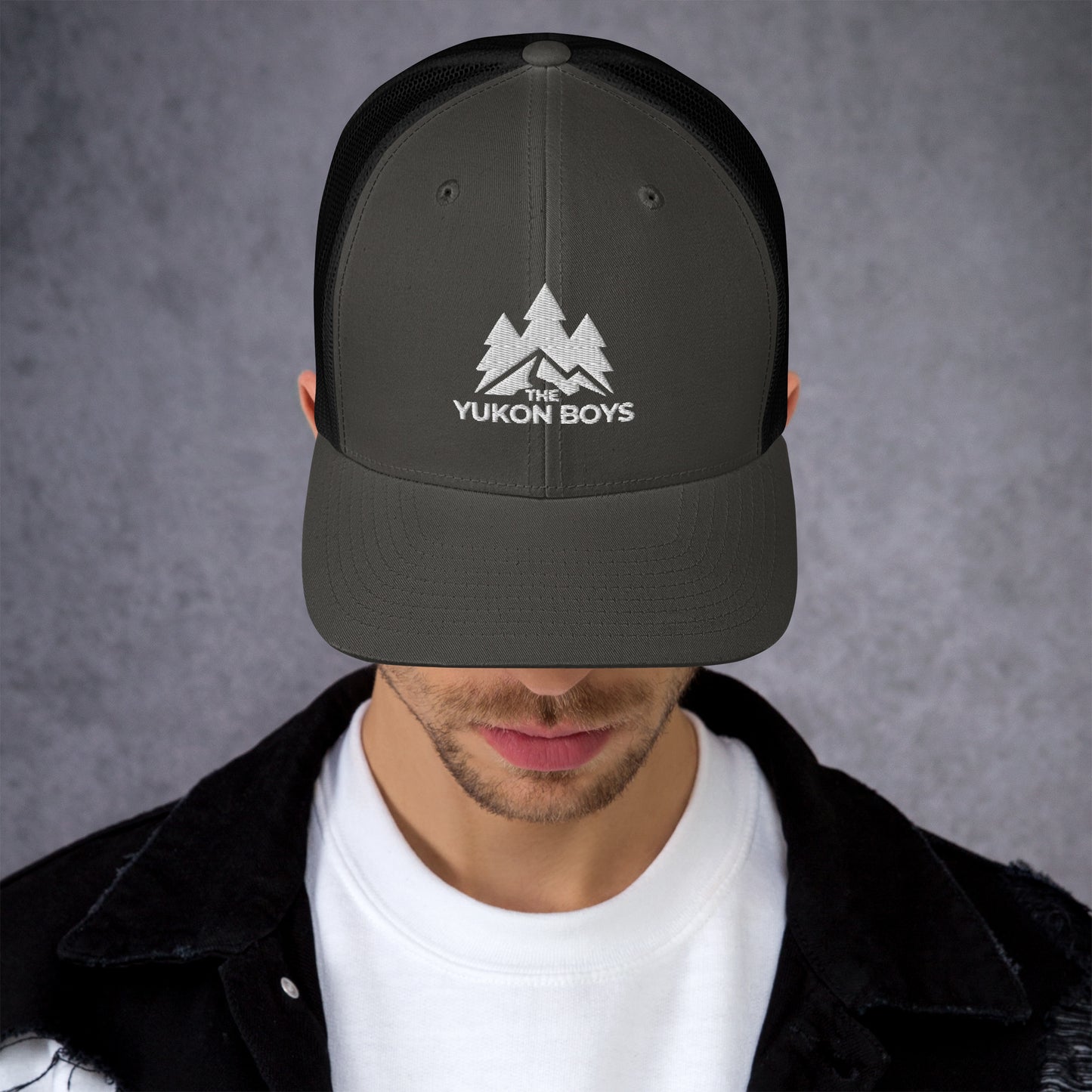 The Yukon Boys Trucker Cap in Charcoal Black, front view