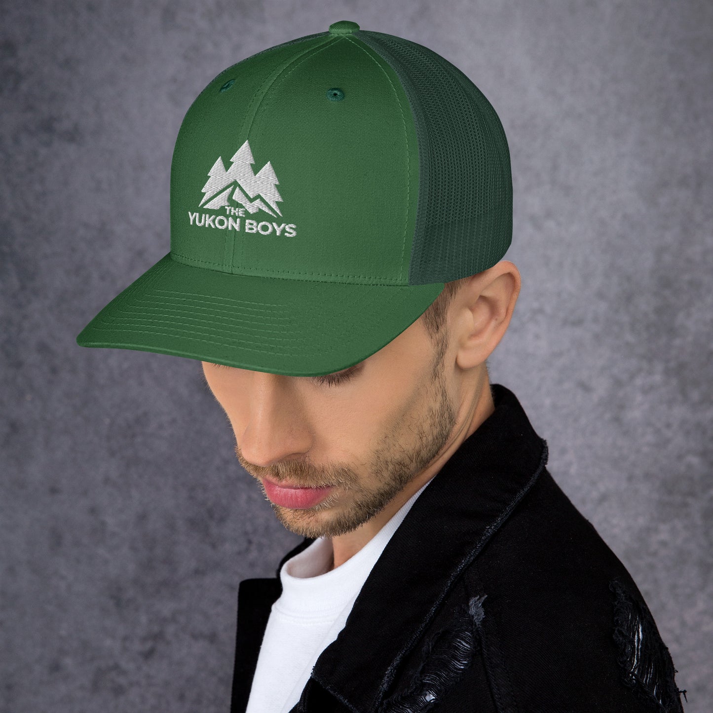 The Yukon Boys Trucker Cap in Evergreen, left side view