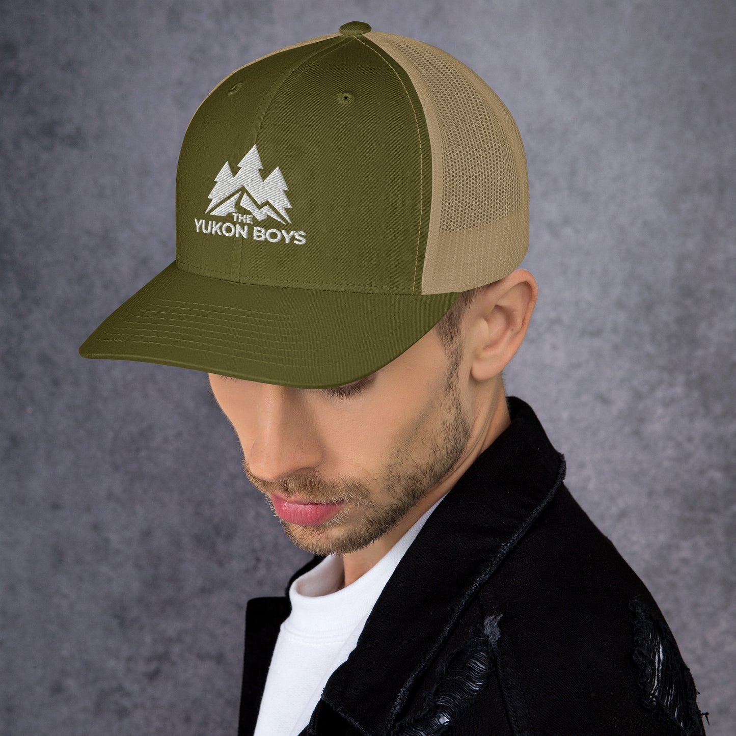 The Yukon Boys Trucker Cap in Moss Khaki, left side view