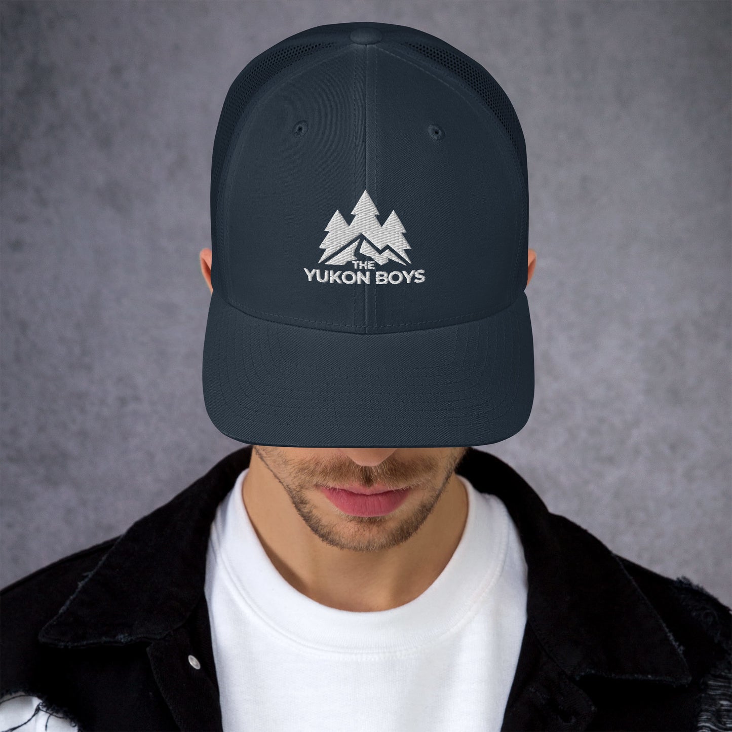 The Yukon Boys Trucker Cap in Navy, front view