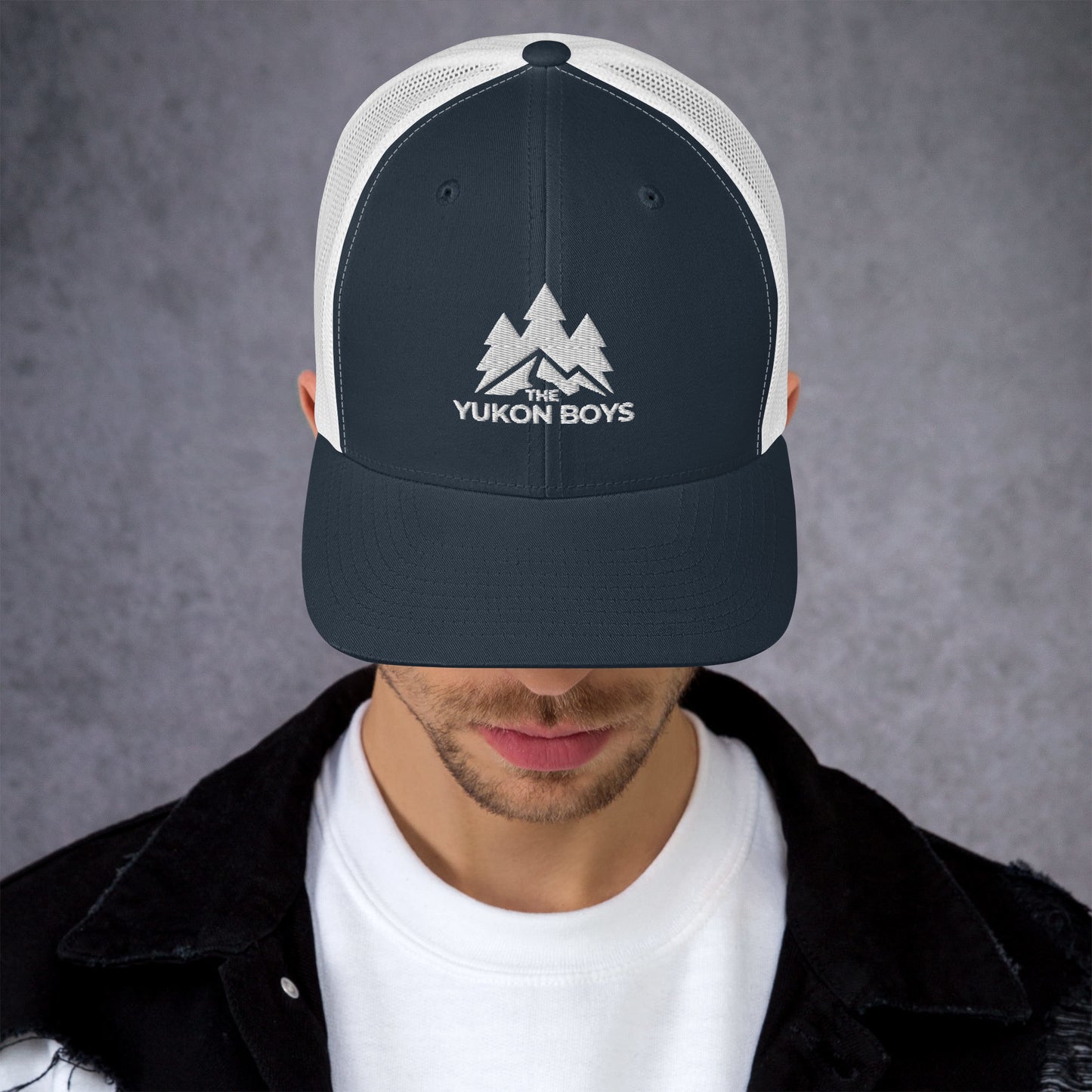 The Yukon Boys Trucker Cap in Navy White, front view