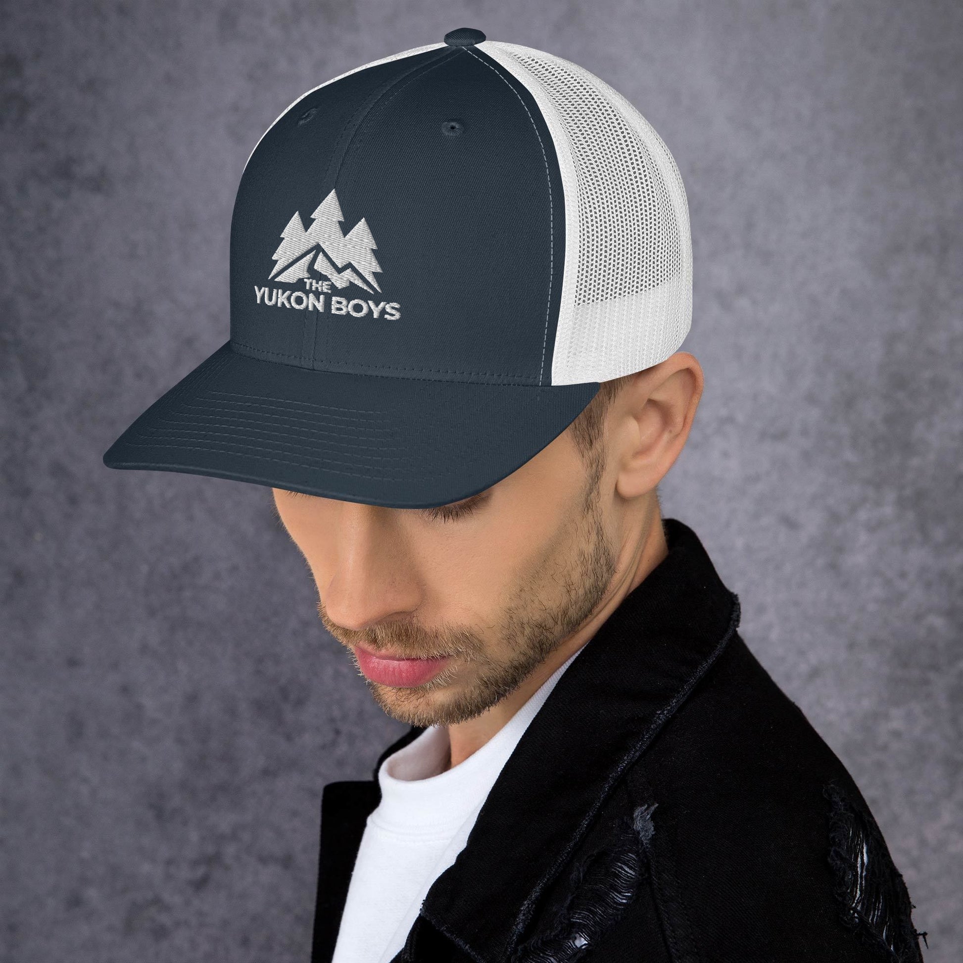 The Yukon Boys Trucker Cap in Navy White, left side view
