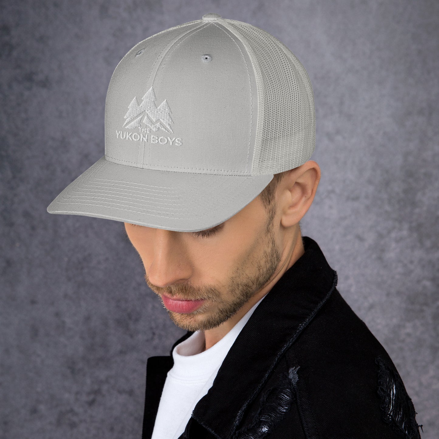 The Yukon Boys Trucker Cap in Silver, left side view